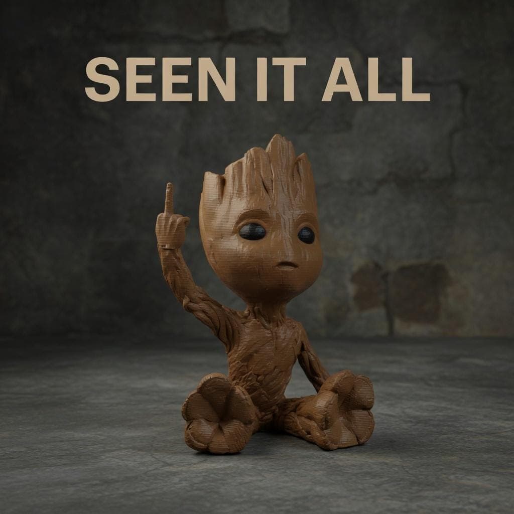 Tree creature figurine showing middle finger placed on desk as funny fantasy decor and sarcastic gift